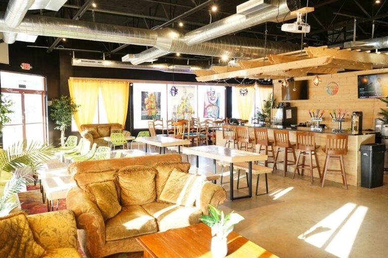 Illustrative dining room tables inside a craft brewery; not a photograph of the named Hudson Valley destination