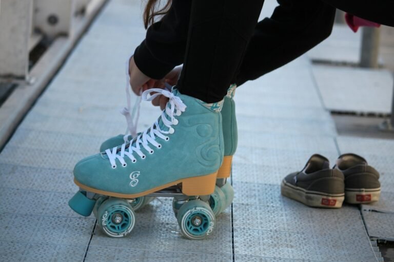 Illustrative pair of blue and white roller skates; not a specific Hudson Valley attraction