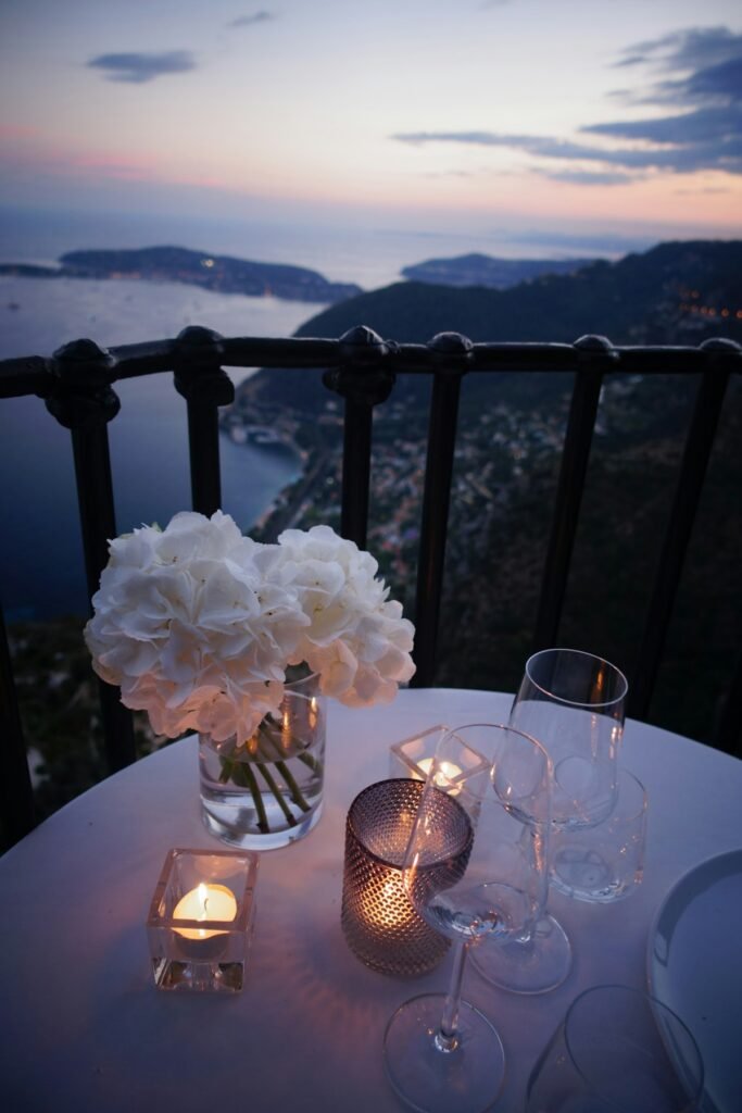 Illustrative wine glasses by romantic candlelight; not a specific Hudson Valley venue
