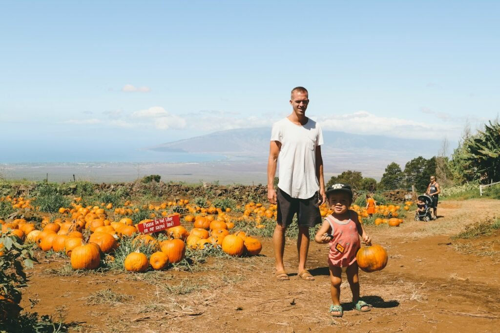 Illustrative a family looking at farm pumpkins; not a specific Hudson Valley venue