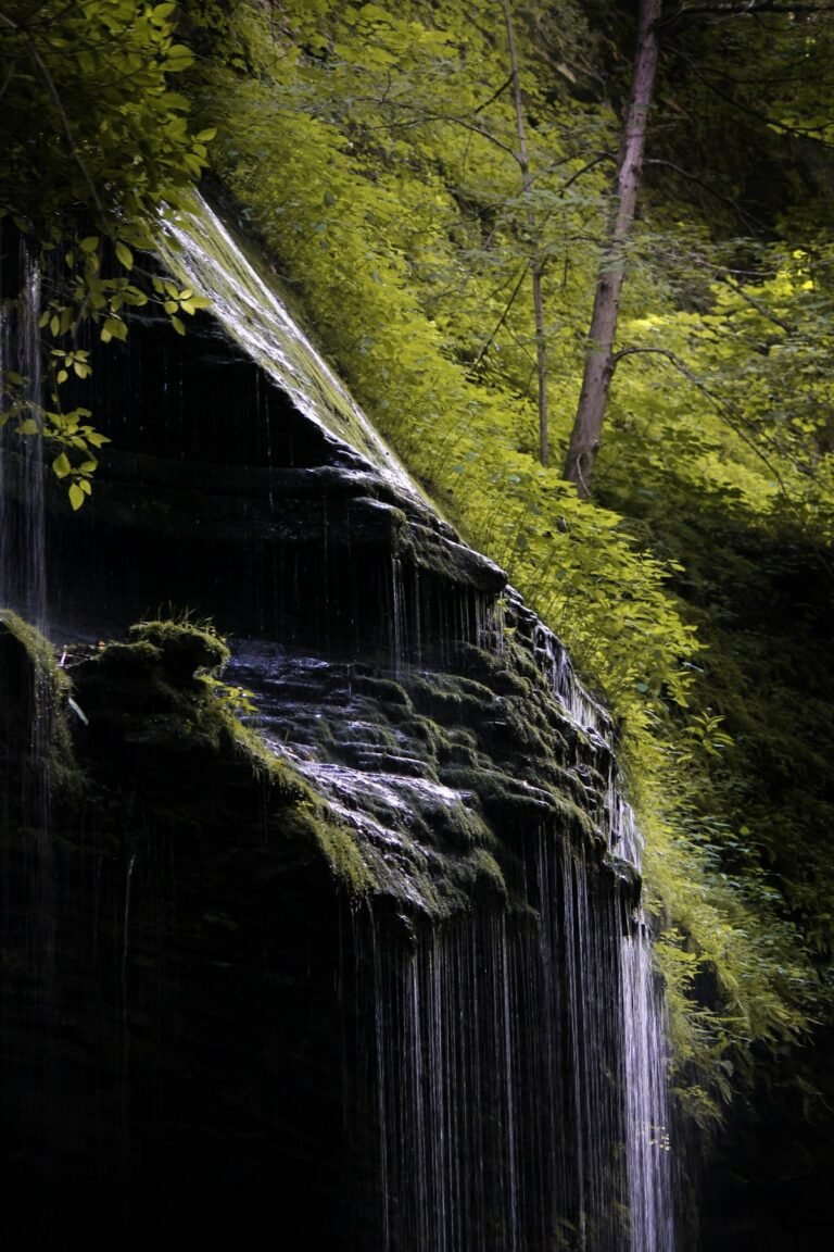 Illustrative mossy cliff waterfall, not necessarily Horseshoe Mine Falls