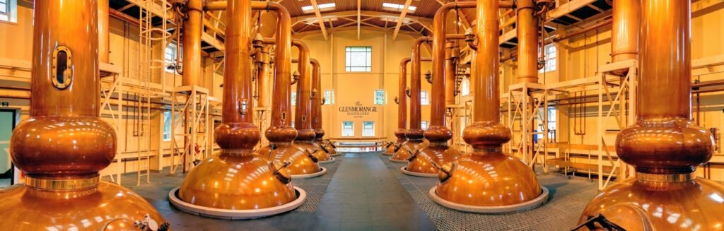 Copper stills in a craft distillery, illustrative photo rather than a named Hudson Valley business